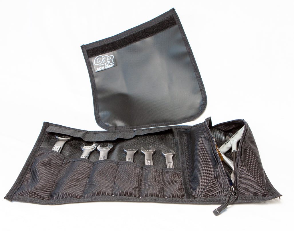 OBR Tool Roll unrolled with assorted motorcycle tools in pockets (tools not included)