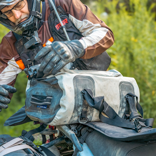 Dan unclipping his OBR 35L dry duffel