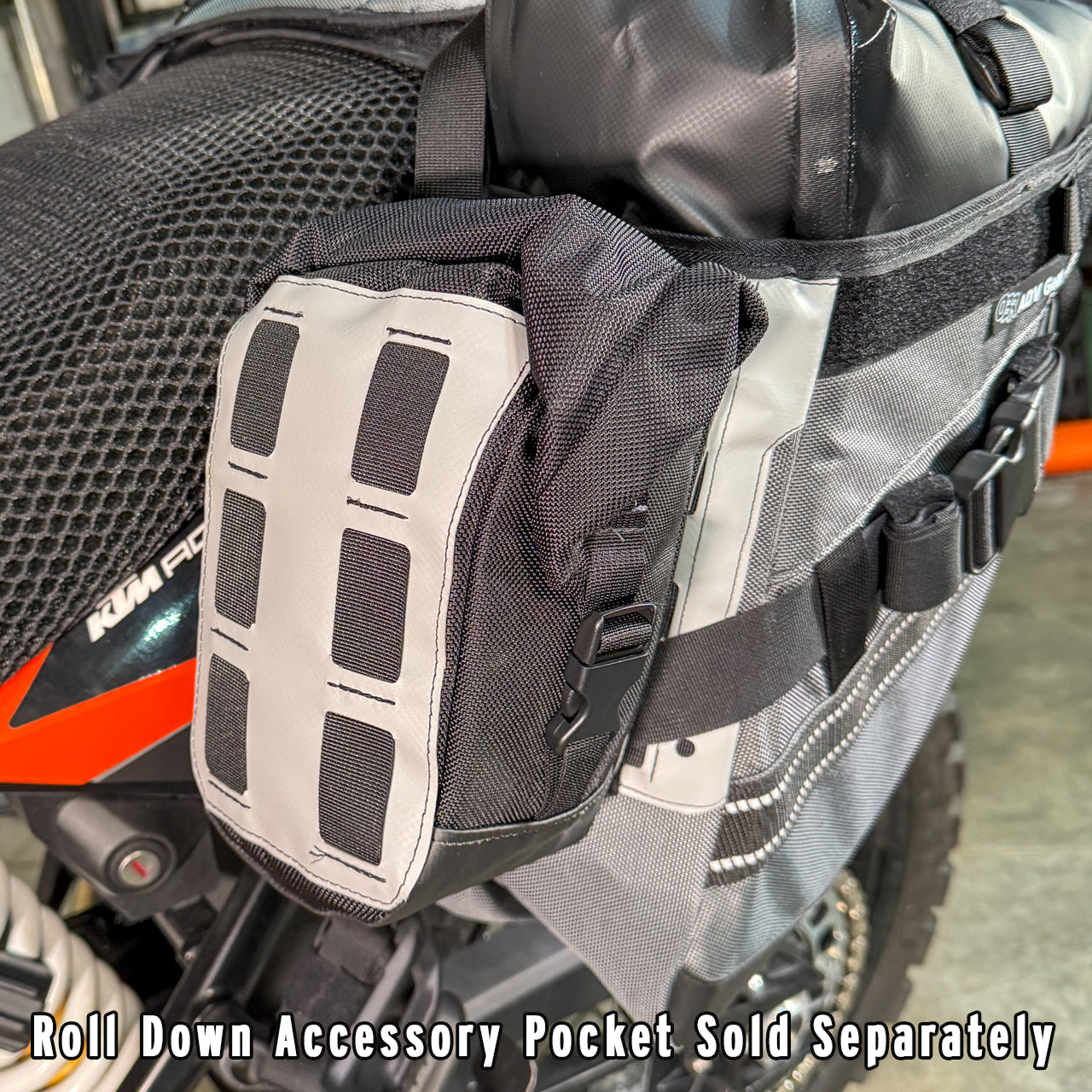 MOLLE webbing on motorcycle saddle bag with roll down accessory pouch attached