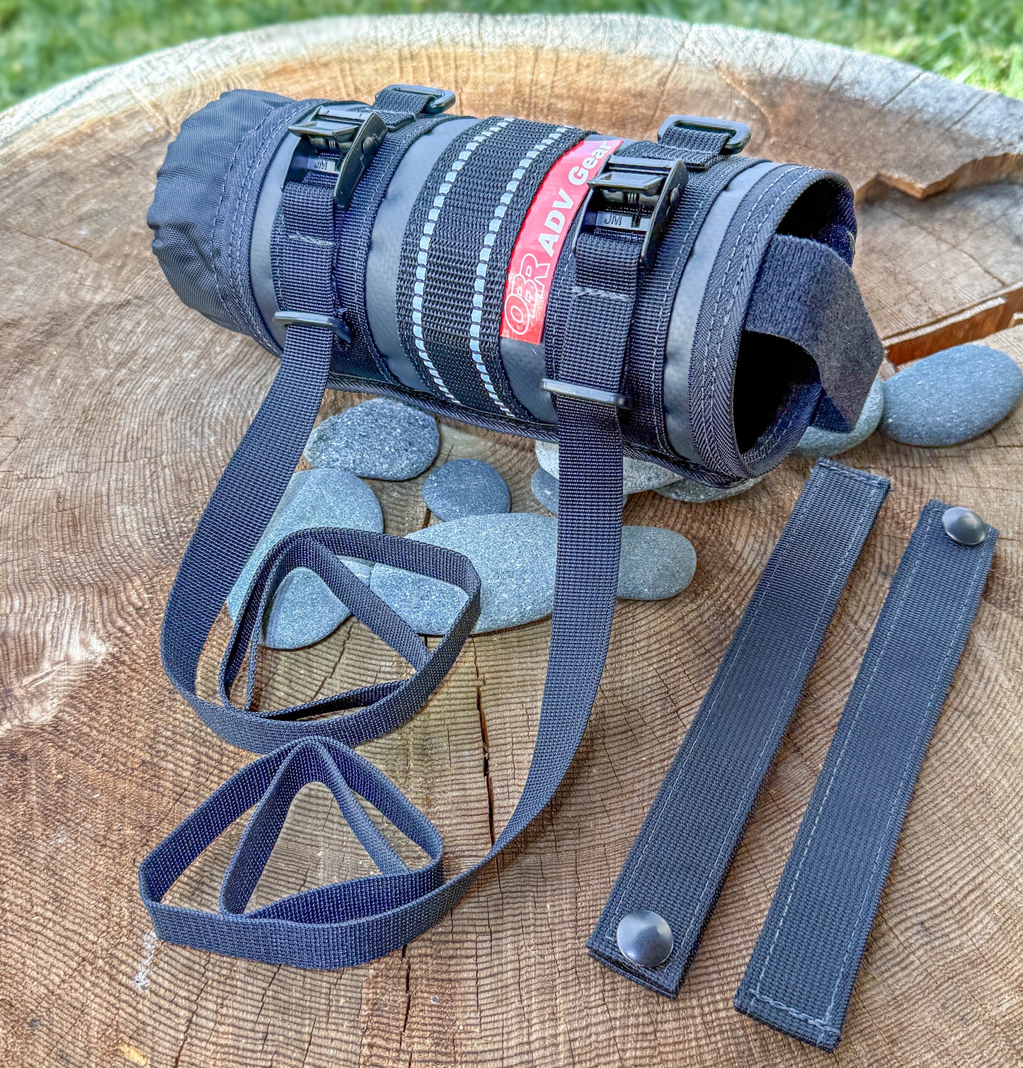 Motorcycle hydration or fuel bottle mount with long reach cam straps