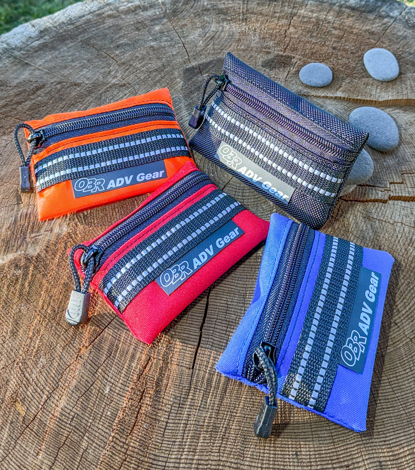 OBR Mini-pouches in all available colors: orange, red, blue, and black.