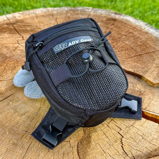 Switchback top view: zippered top mesh pocket and shock cord