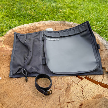 OBR Tool Roll unrolled and empty showing organized pocket layout, hub pad attached