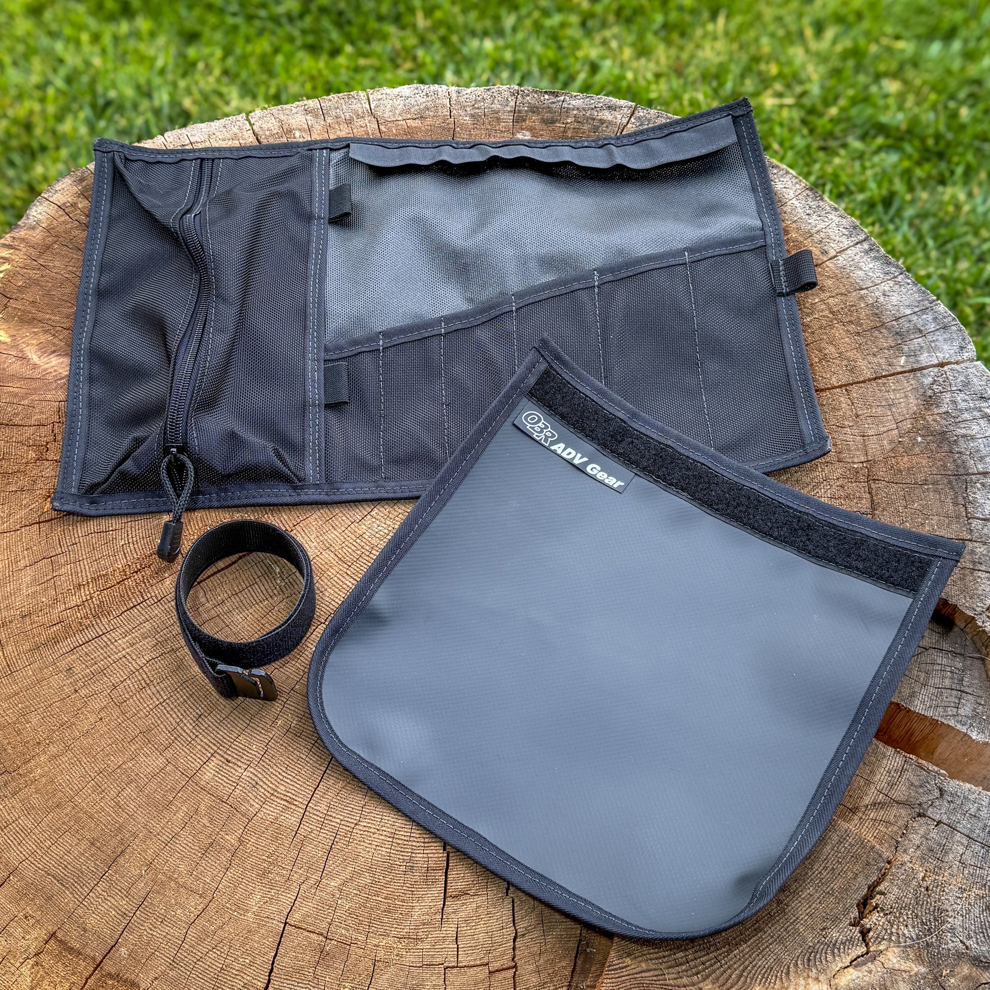 OBR Tool Roll unrolled and empty showing organized pocket layout, hub pad detached
