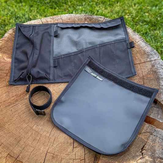 OBR Tool Roll unrolled and empty showing organized pocket layout, hub pad detached